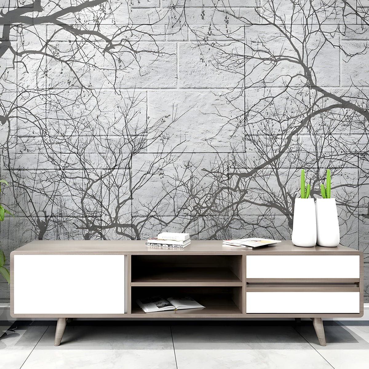 Papier peint panoramique de branches noires sur mur de pierre grise dans un salon