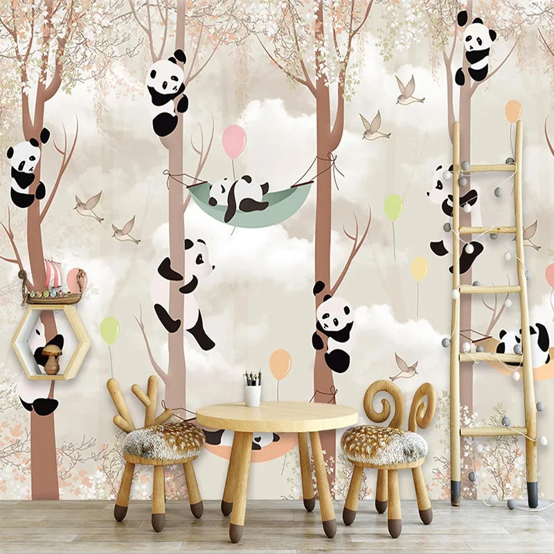 Décor mural avec pandas grimpant dans des arbres fleuris roses et ballons colorés