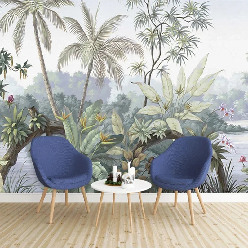 Papier peint panoramique tropical avec palmiers et feuillage vert dans un salon