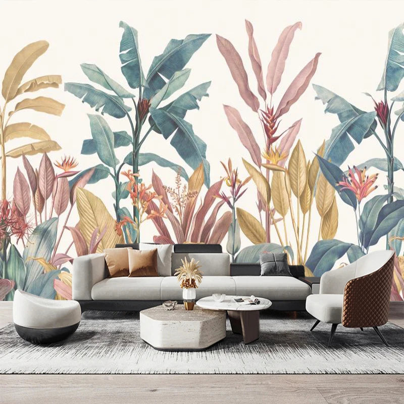 Papier peint panoramique de feuillages tropicaux pastel dans un salon avec canapé blanc
