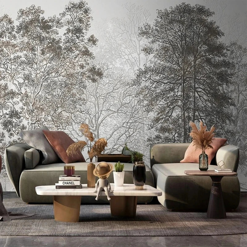 Salon avec panoramique forêt d'arbres dessinés gris derrière deux canapés kaki