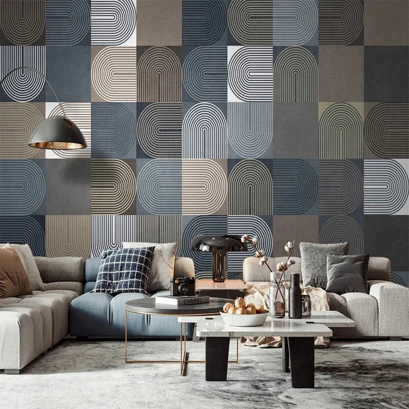 Mur de salon orné d'un motif géométrique d'arches bleu, gris et beige