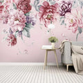 Papier peint panoramique à pivoines aquarelle roses sur fond rose dans un salon