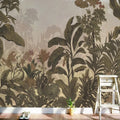 Papier peint panoramique jungle tropicale aux feuillages vert olive sur fond beige