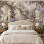 Papier peint panoramique jardin fleuri avec arches de roses, glycines et fontaine ancienne